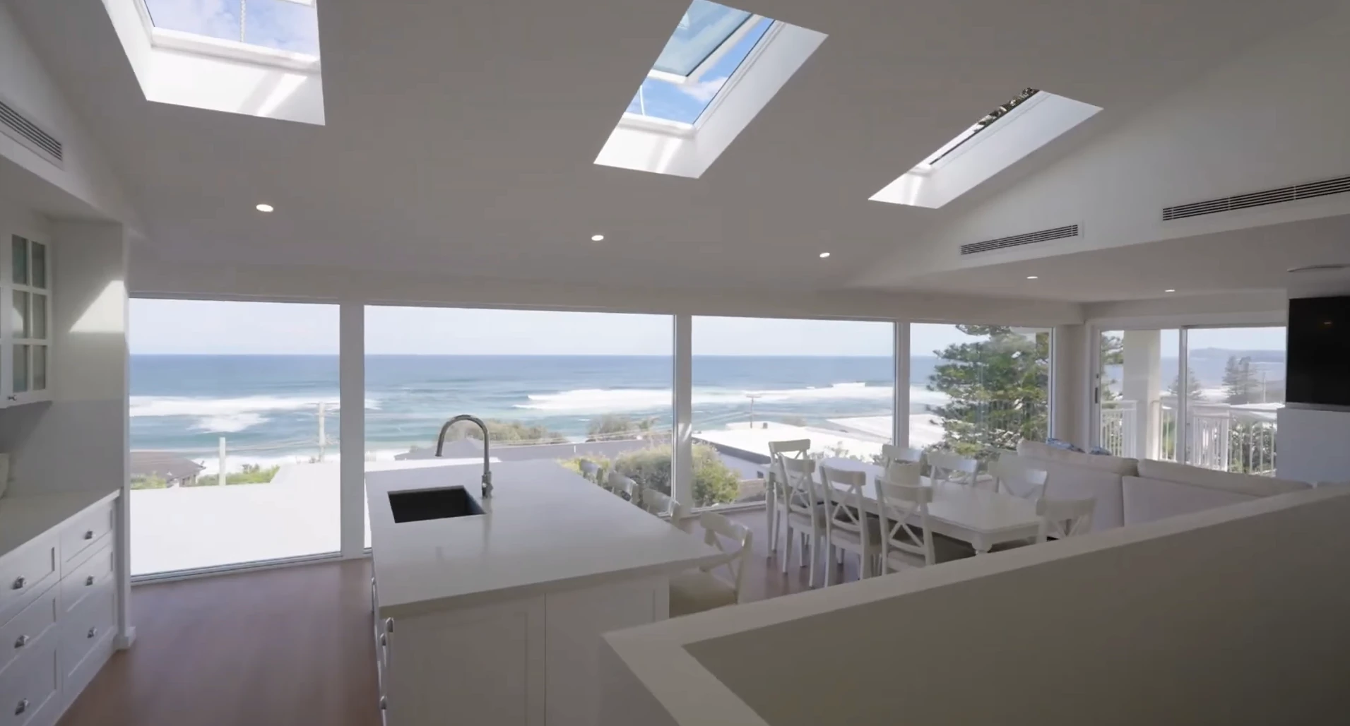 Kitchen with an ocean view photographed by Atlantix Studios